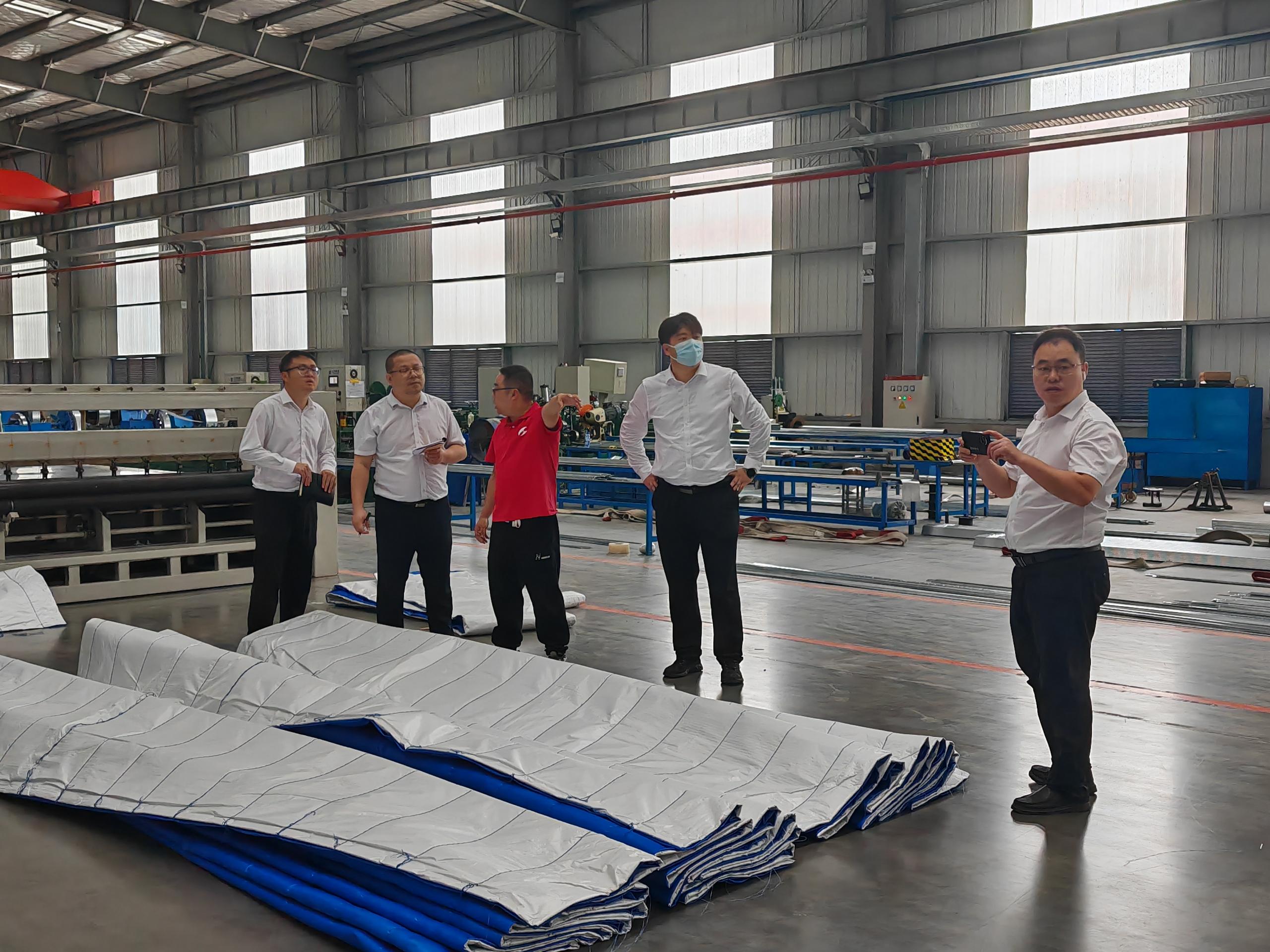 Una delegación de la Cuarta Oficina de Ingeniería de Construcción de China visita la base de Yibin de Hele Windows & Doors para inspección e intercambio